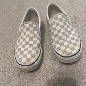 Vans slip-on checkerboard shoe. Woman’s 7.5. Men’s 6.